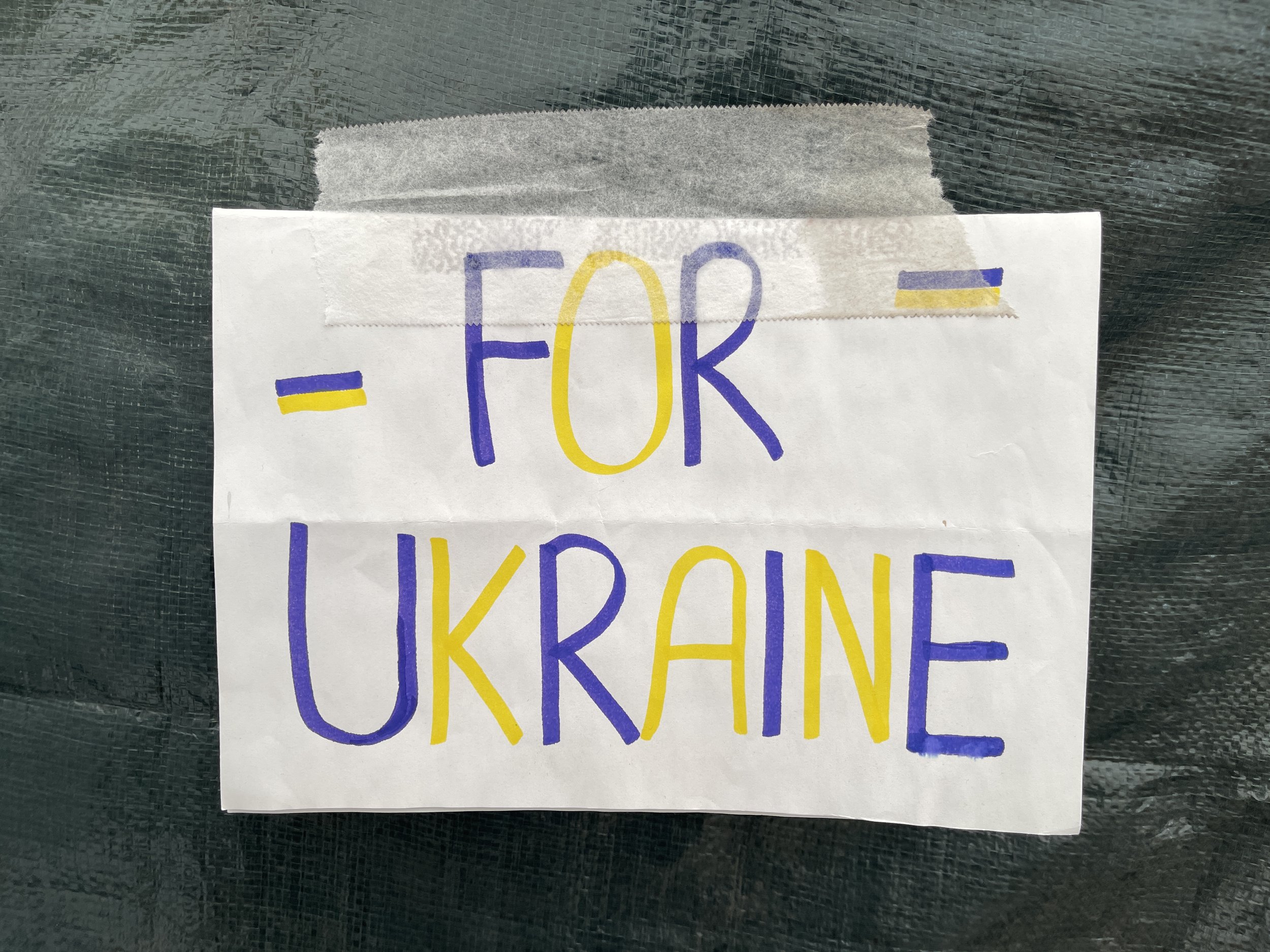 FOR UKRAINE sign at a United Nations health clinic in Lviv, Ukraine.